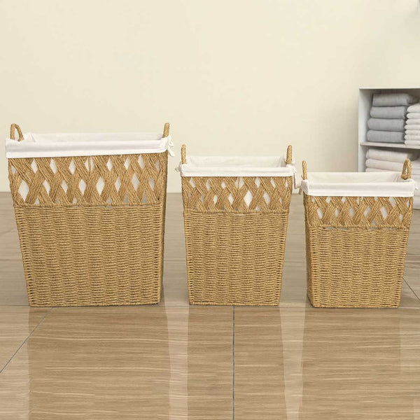 Three woven laundry baskets with white lids on a tiled floor.