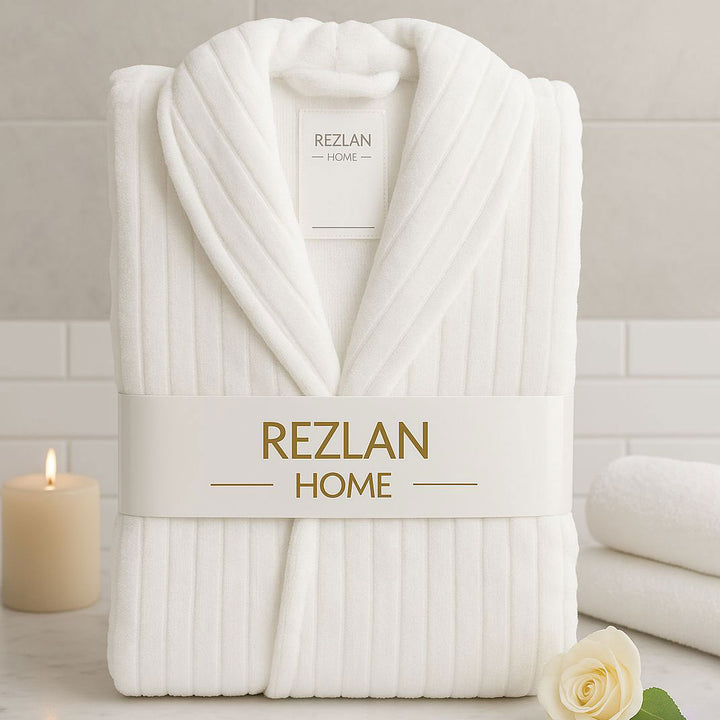 White robe with 'REZLAN HOME' branding on a neutral background