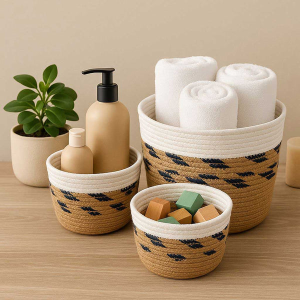 Set of woven baskets with various items on a wooden surface