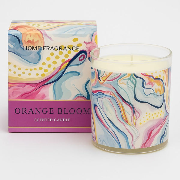 Scented candle with colorful packaging labeled 'Orange Bloom' on a white background