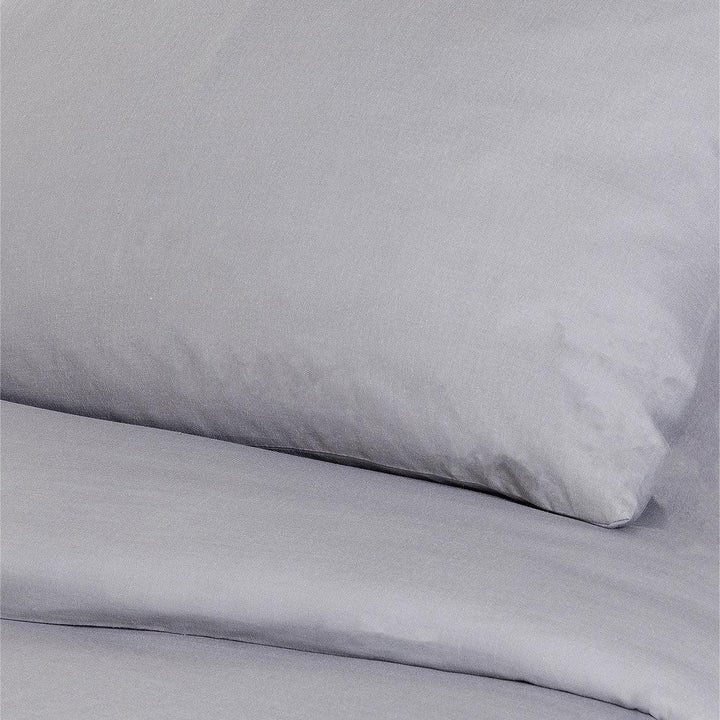 Close-up of light gray plain cotton duvet cover set – clean, minimalist design with soft texture for spring and summer