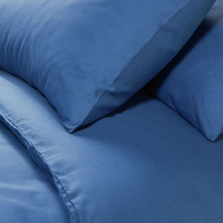 Close-up of zephyr blue plain cotton duvet cover set – soft blue tone with smooth texture for spring and summer bedding