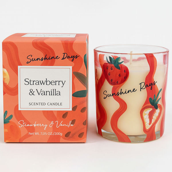 Strawberry and Vanilla scented candle with packaging on a white background