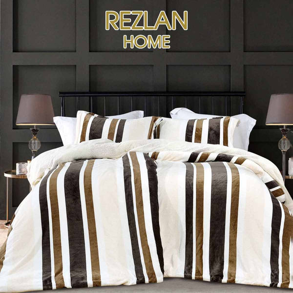 Striped bedding set on a bed with 'Rezlan Home' branding in the background.